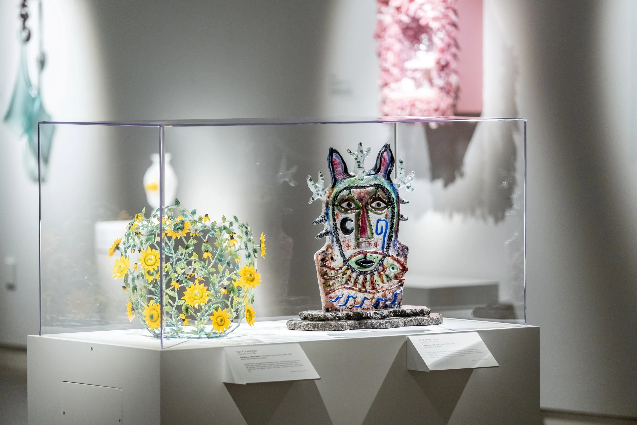 Glass sculptures on display in the gallery.