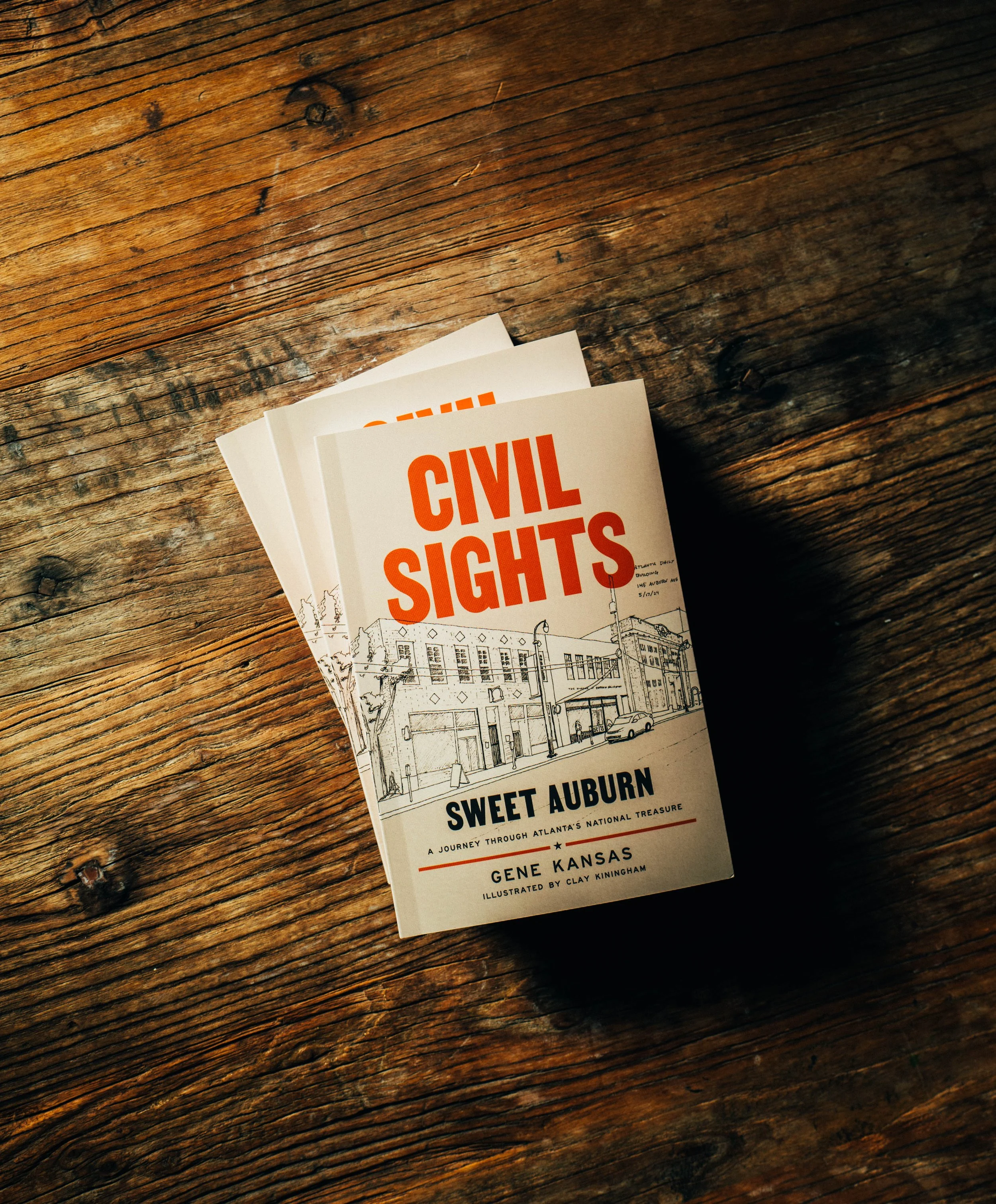 Brochure titled 'Civil Rights Sights', featuring an architectural illustration of a building on a wooden surface.