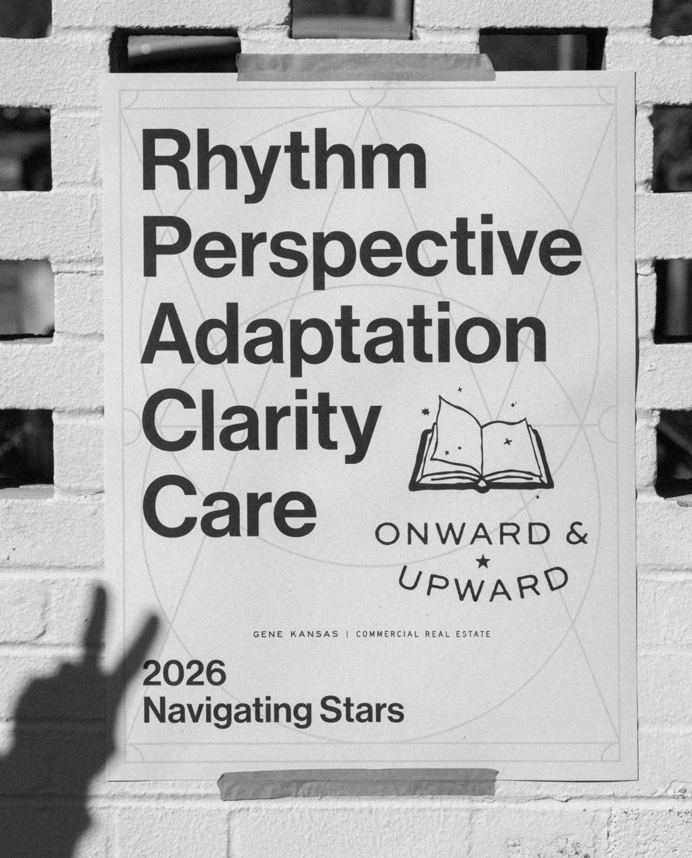 A flyer about the 2026 Navigating Stars event with themes of rhythm, perspective, adaptation, clarity, and care, featuring a graphic of an open book, on a brick wall.
