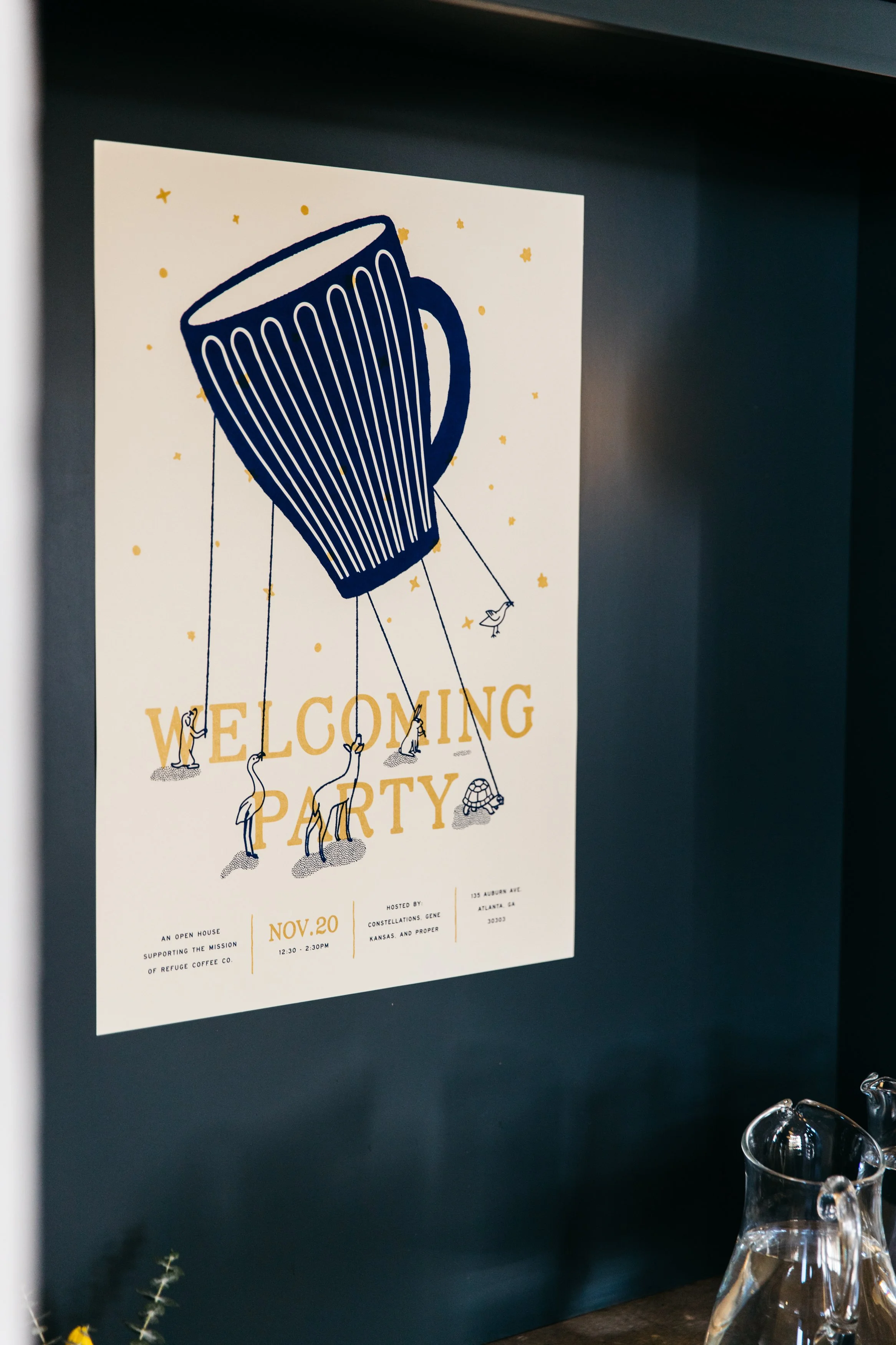 A poster for a welcoming party featuring a hot air balloon shaped like a coffee mug with small figures climbing the strings, set against a background with small stars.