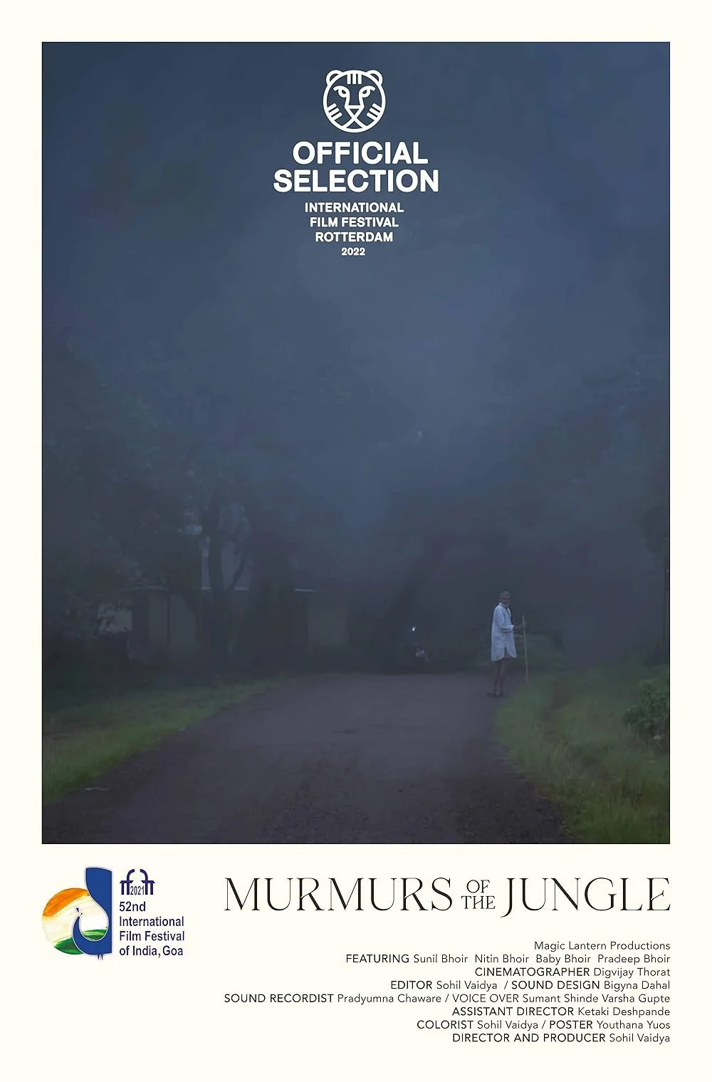 Poster for the film 'Murmurs of the Jungle,' featuring a misty jungle path with a man in white clothing walking with a stick, and text indicating official selection at the 2022 Rotterdam International Film Festival.