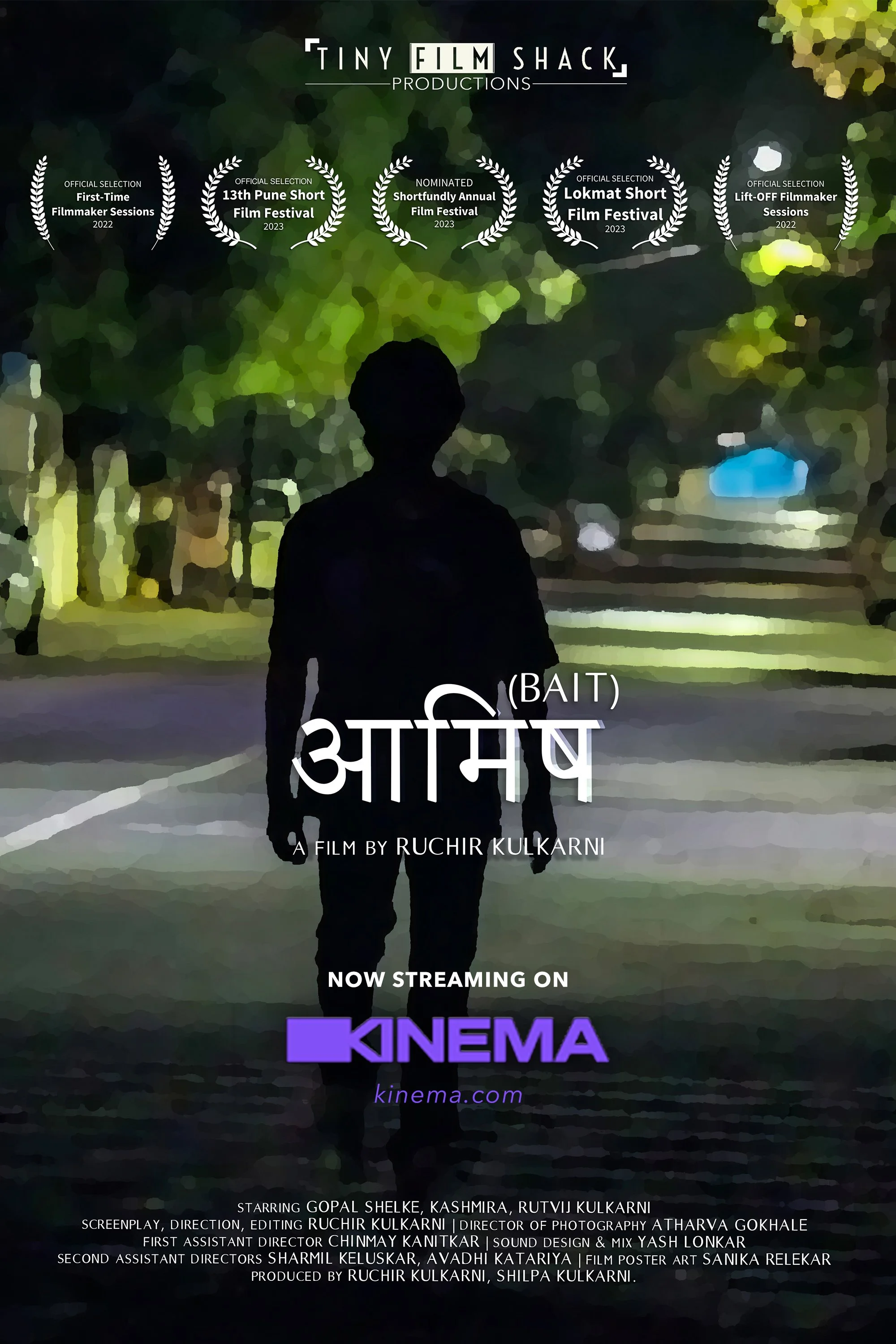 Poster for the film 'Bait' by Ruchir Kulkarni featuring a silhouette of a man walking on a street with trees and lights in the background. Includes laurels from film festivals and streaming information for Kinema.