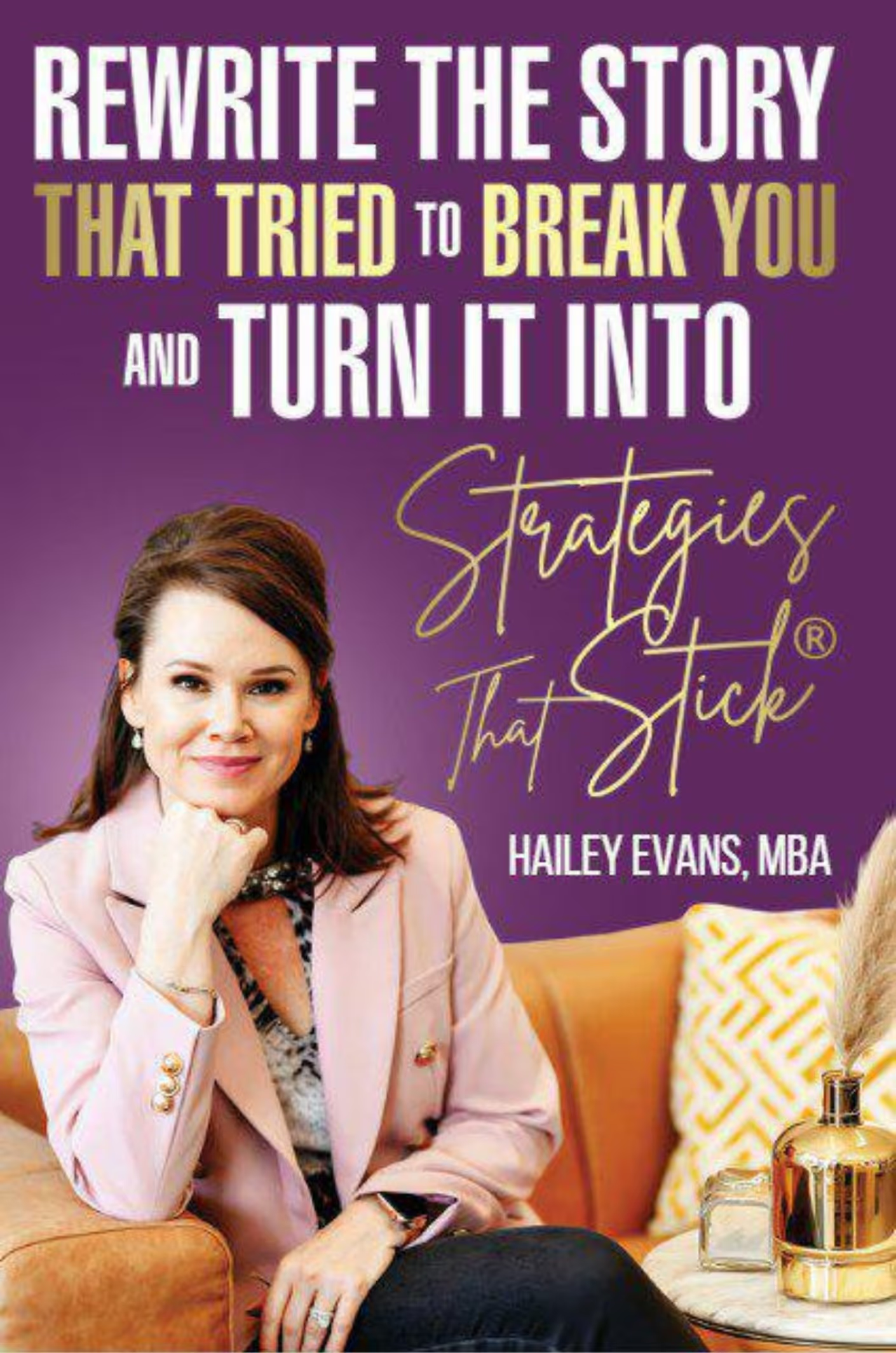 Book cover titled "Rewrite the Story that Tried to Break You and Turn It Into Strategies That Stick" by Hailey Evans, MBA, featuring a woman with brown hair sitting on an orange chair, with a purple background and gold decorative details.