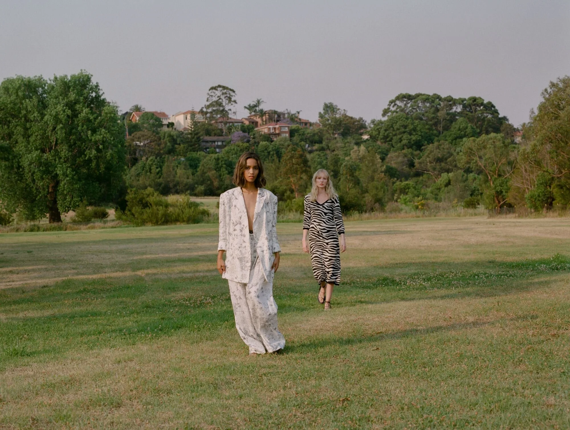 Khai wears Leo &amp; Lin suit @leoandlin, Maria Farro sandals @mariafarrofootwear // Zhon wears Kate Sylvester dress @kate_sylvester, Maria Farro sandals @mariafarrofootwear