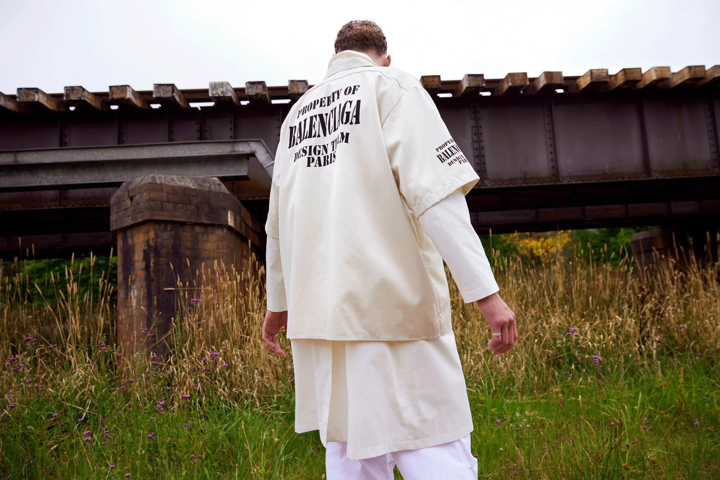   Balenciaga shirt over Emporio Armani trench coat. Dion Lee utility pants   