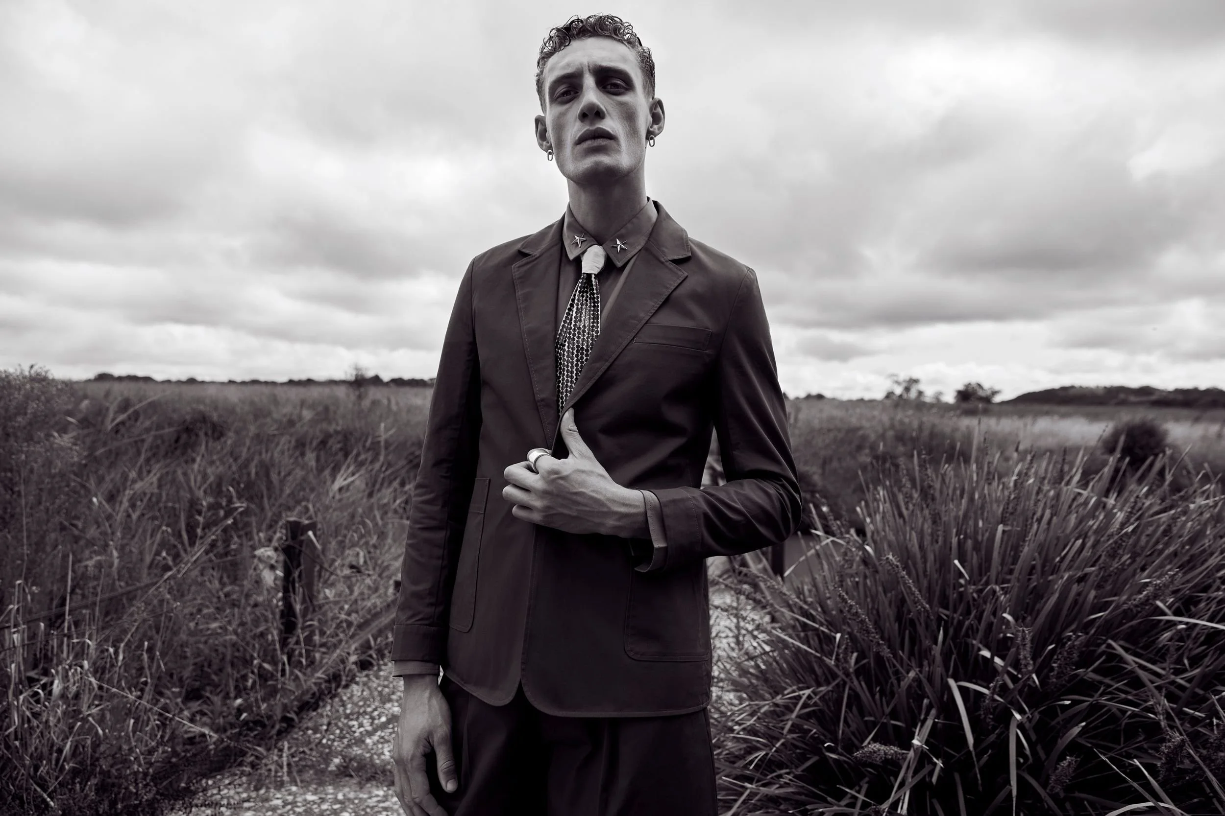   Nique jacket, shirt and pants. Lanvin tie. Collar studs stylist own   