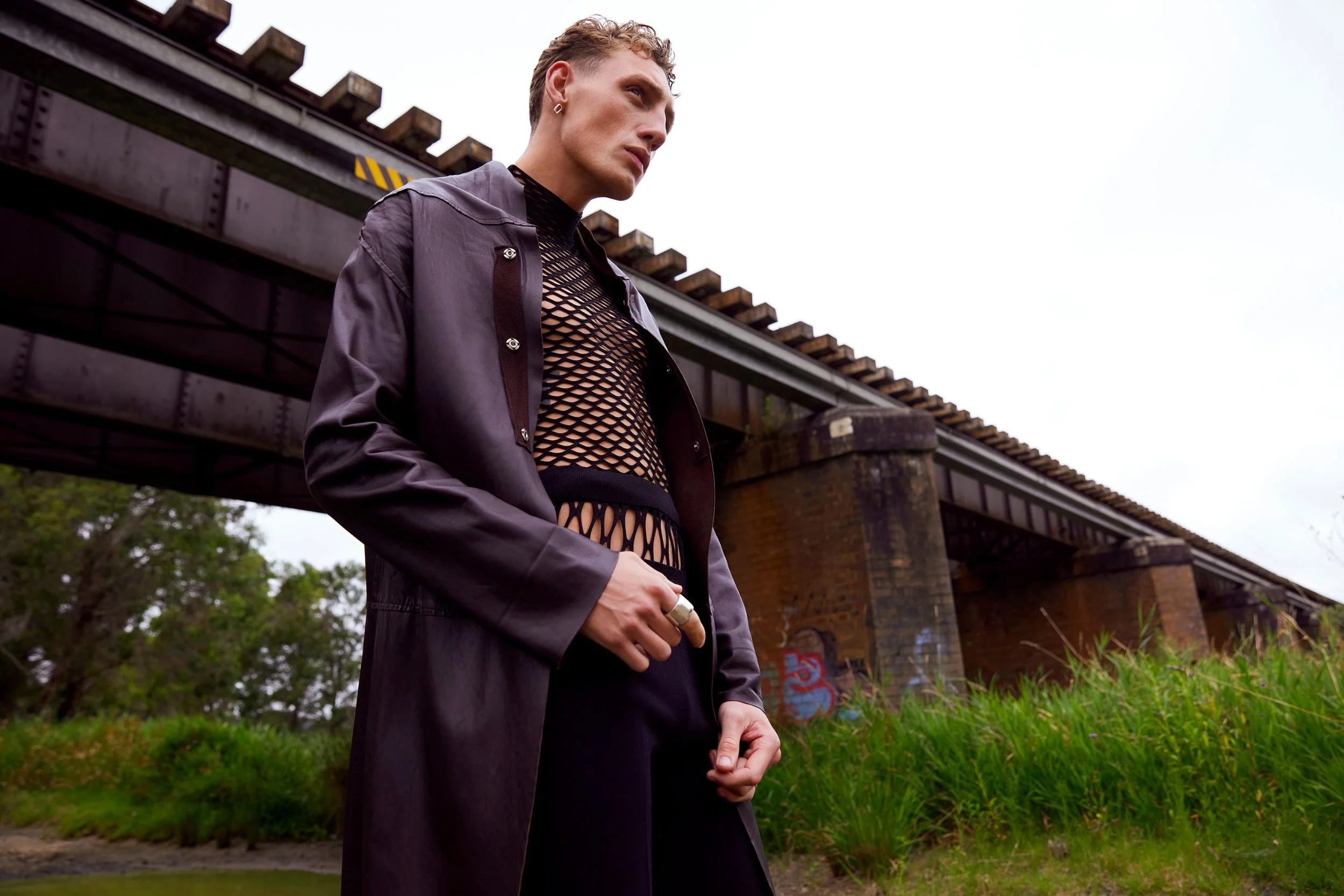   Dion Lee mesh top, and pants with mesh panel. Akira Isogawa leather coat   