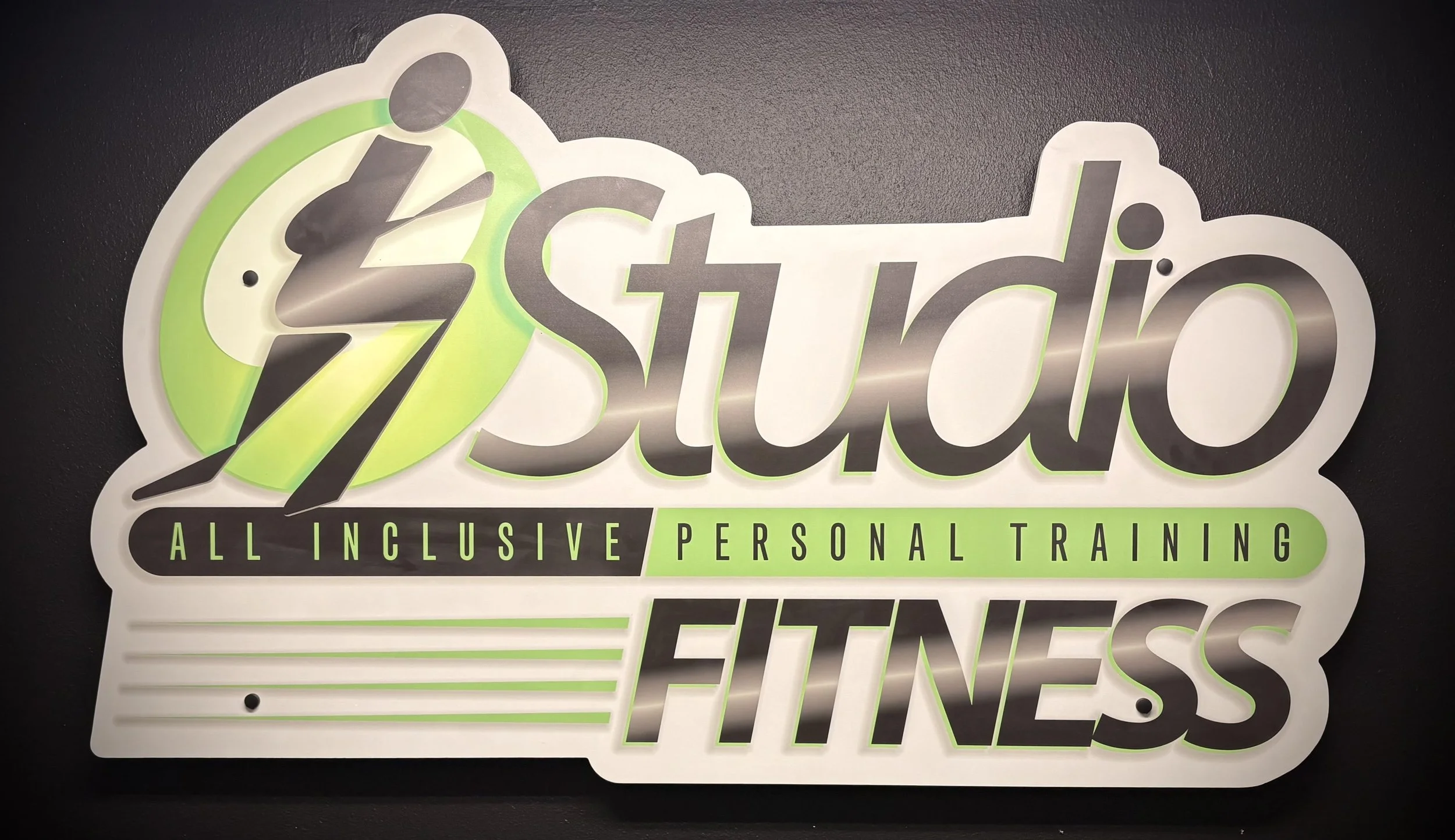 Sign for a personal training business called Z studio, with the words 'ALL INCLUSIVE PERSONAL TRAINING' and mentioning 'EFT NESS' at the bottom.