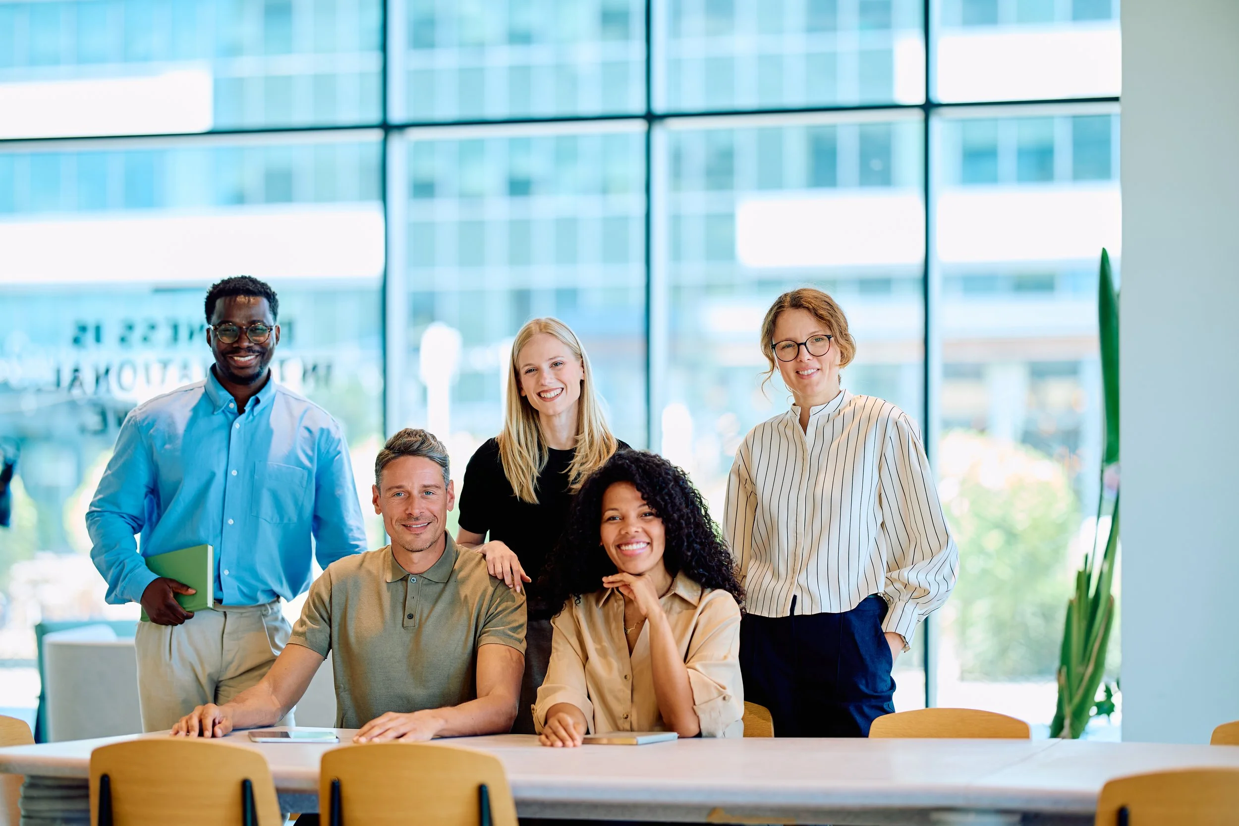 diverse-business-team-smiling-at-a-modern-office-w-2026-06-02-15-55-18-utc.jpg