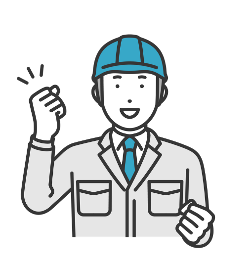 ヘルメットをかぶった建設業の男性が笑顔でガッツポーズをしている