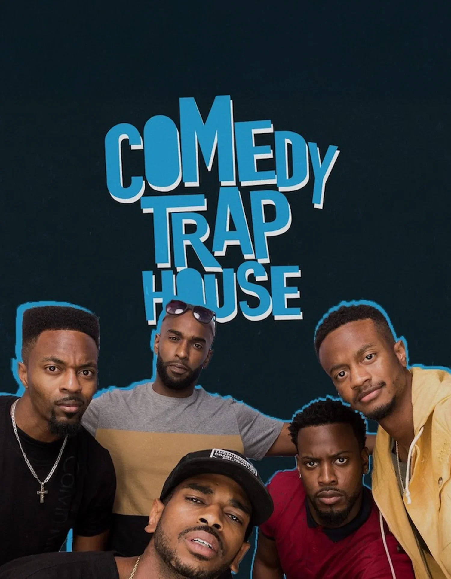 Group of young men taking a selfie in front of a 'Comedy Trap House' sign with multiple men's faces.