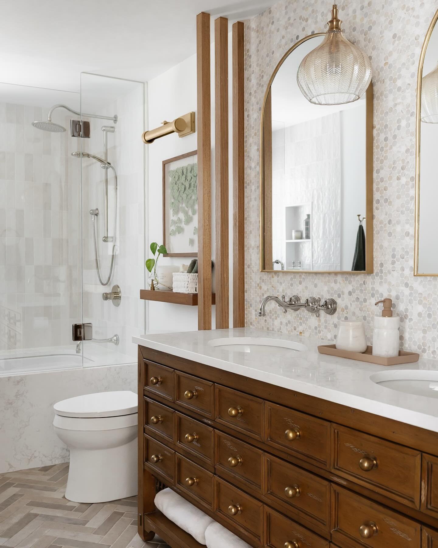 We called this one the Modern Heirloom from the start. The name made every decision easier.

The vanity anchors the room the way a piece of inherited furniture does. Present without demanding. The unlacquered brass will develop its own patina over ti