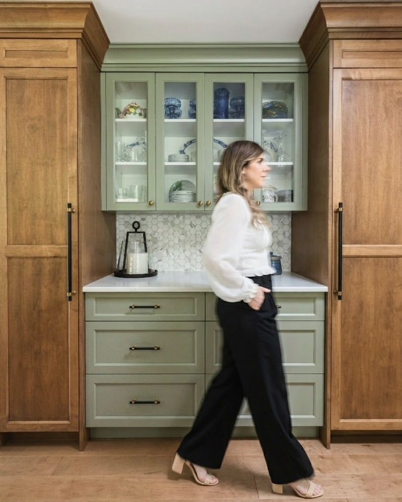 kitchen design with wood stained and sage green custom cabinetry and marble backsplash  by maggie venne