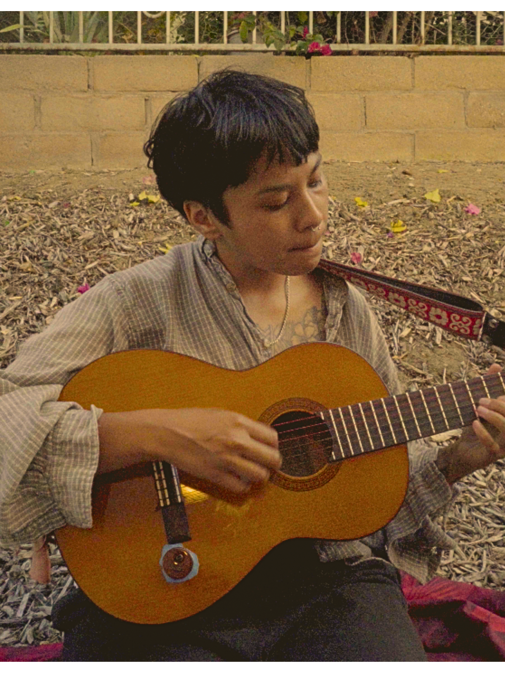 poli with their guitar
