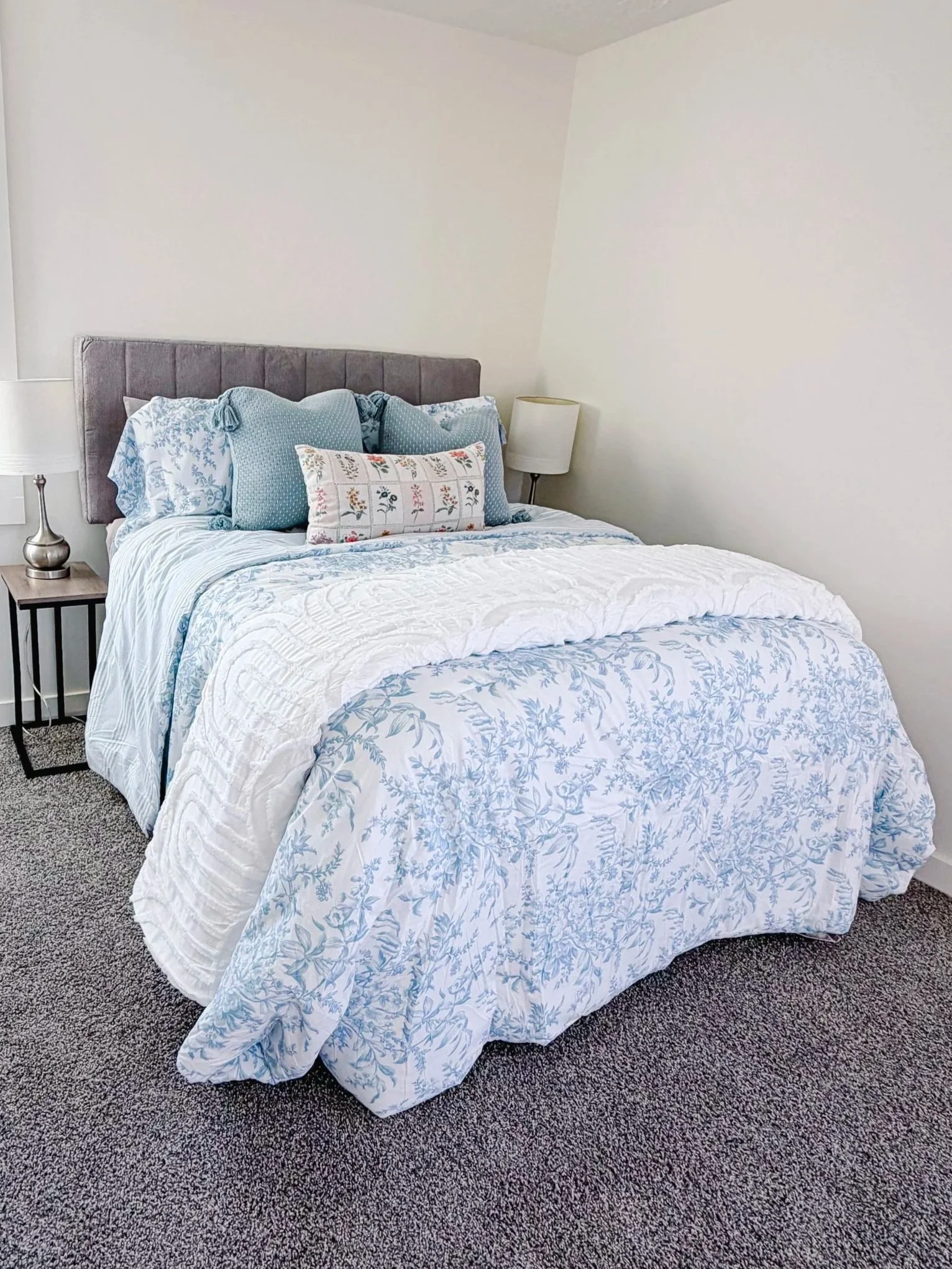 Model home staging bedroom in Dresden Tennessee with clean, modern farmhouse style