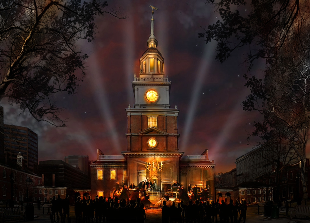 A nighttime scene of a large brick building with a clock tower, illuminated windows, and spotlights shining up into the stormy sky. A crowd of people is gathered in front, and an orchestra is performing beneath a chandelier at the entrance.