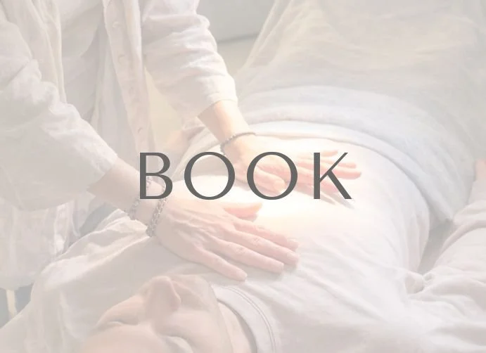 Our practitioner doing Energy Balancing work on a client to clear blockages and restore balance