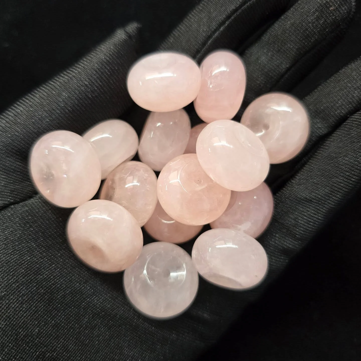 Rose Quartz Donut Pendant 
...
The circular form is often associated with wholeness, continuity, and balance &mdash; with the open center representing flow, release, and space. Paired with rose quartz, the shape creates a piece that feels gentle, gro
