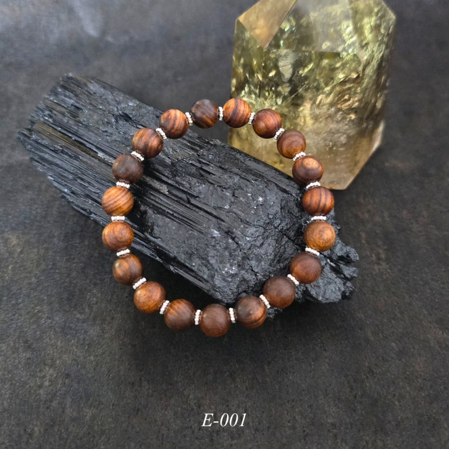 E-001 // Available on the website
Sandalwood 

Fits 15-16cm wrist size, custom resizing available.

Minimal stones. Quietly worn.

#wearabledepth #handmadebracelet #minimaljewelry #crystalbracelet #naturalstonebracelet