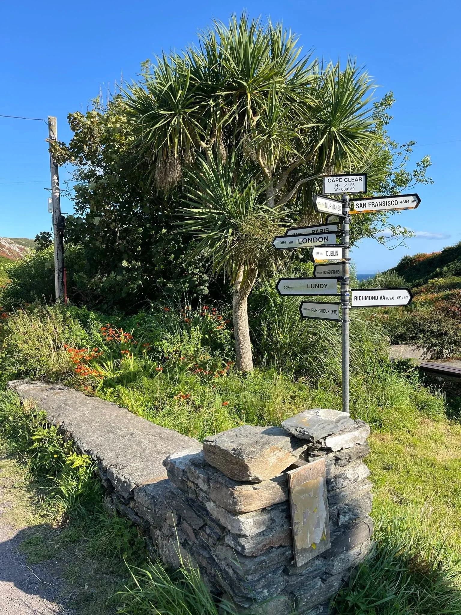 Signpost at Cape Clear Island on the West Cork coast, Ireland