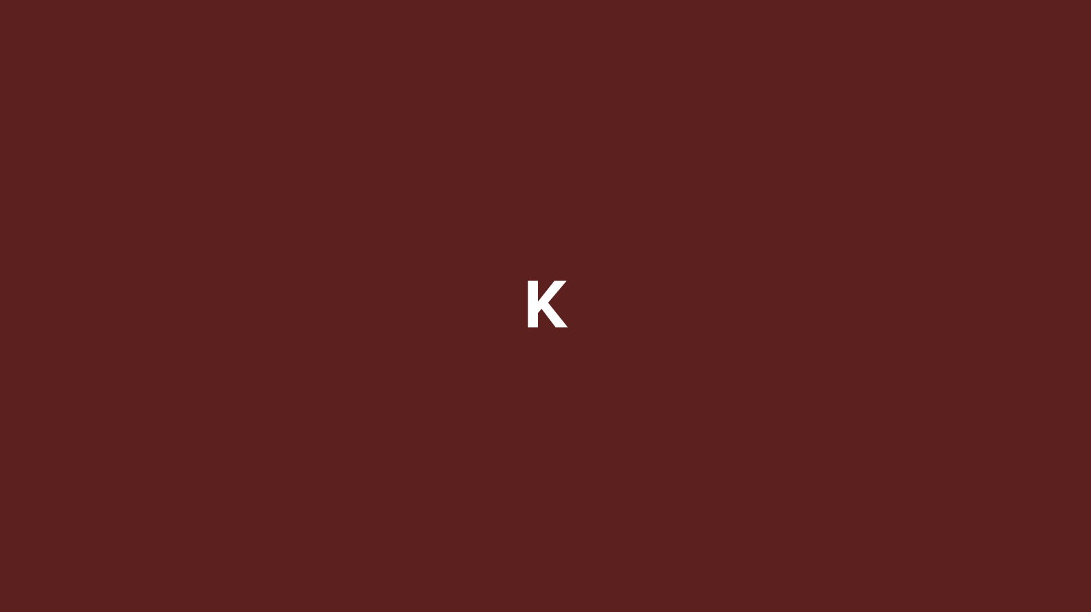 Maroon background with a white letter 'K' in the center.