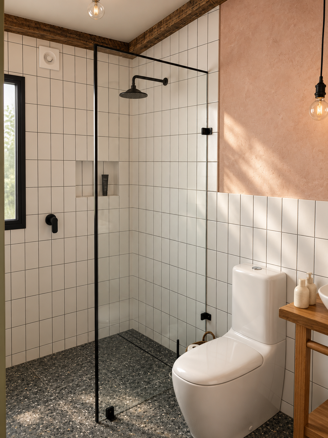Modern bathroom with white tiled walls, a walk-in shower with black fixtures, a black-framed window, a white toilet, a wooden shelf with bottles, and a pink accent wall. Modern lighting fixtures are also visible.