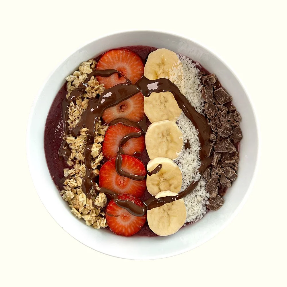 Chocolate Sunset - Organic acai, vegan and organic granola, cacao nibs, strawberries, banana, coconut, nutella drizzle.