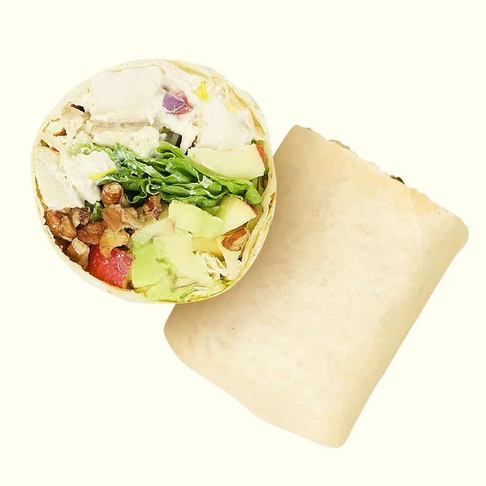 Chicken Salad Wrap - House made chicken salad with celery and cranberries, apple,
tomato, pecan pieces, and romaine
in a flour tortilla. Contains Gluten