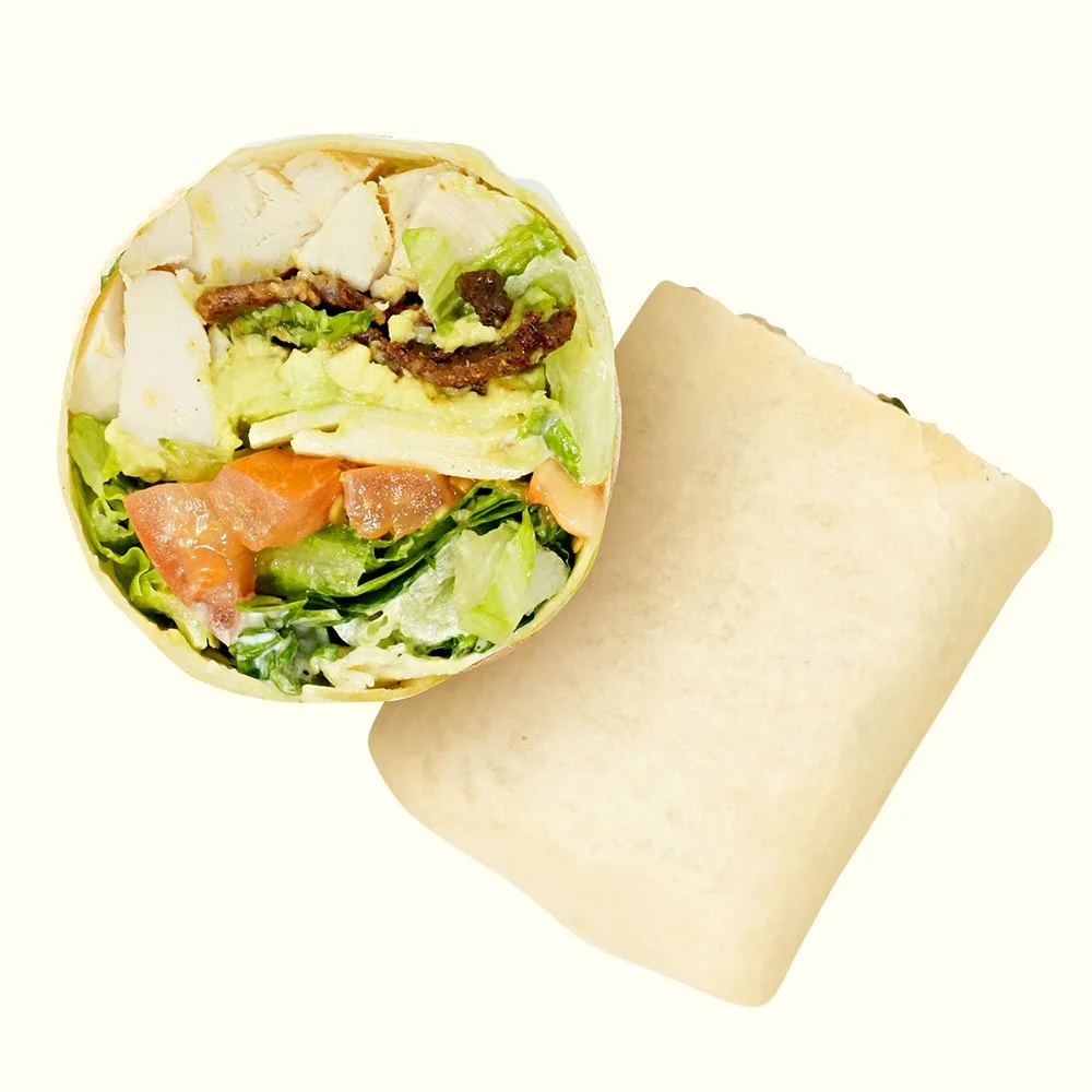 Chicken BLT - All natural chicken, candied bacon, pepperjack cheese, romaine, tomato, avocado and ranch dressing in a flour wrap. Contains Gluten