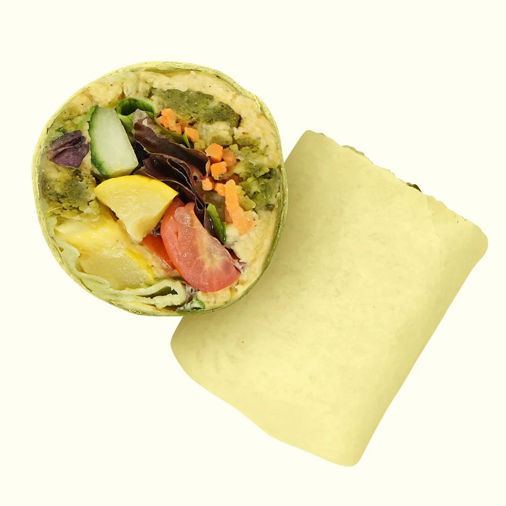 Greek Falafel - Falafel, hummus, spring mix, squash, tomato, cucumber, pickled carrots
and Mediterranean red wine in a flour wrap.
Contains Gluten