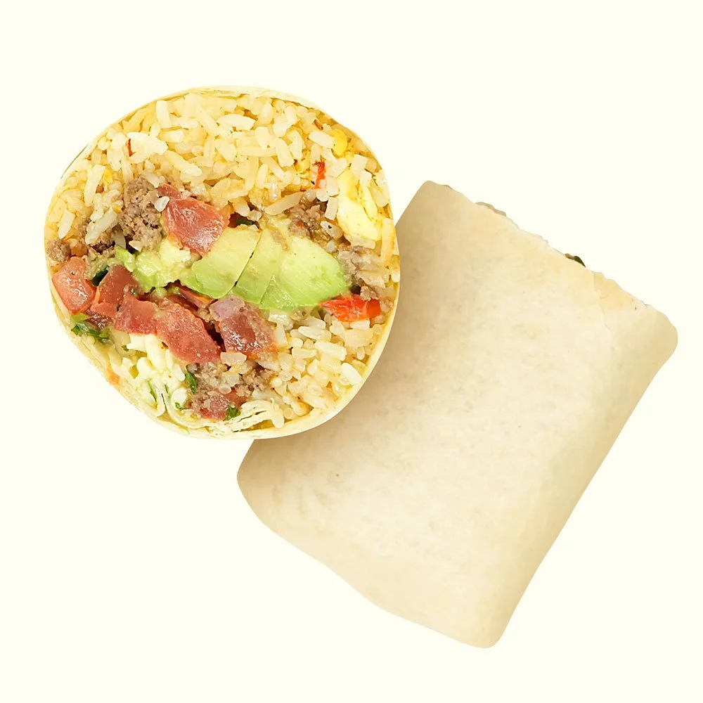 Mexicali Burrito - Grass-fed ground beef, rice, bell peppers, onion, scrambled eggs, cheese blend, salsa verde, avocado & housemade pico de gallo in a flour wrap. Contains Gluten