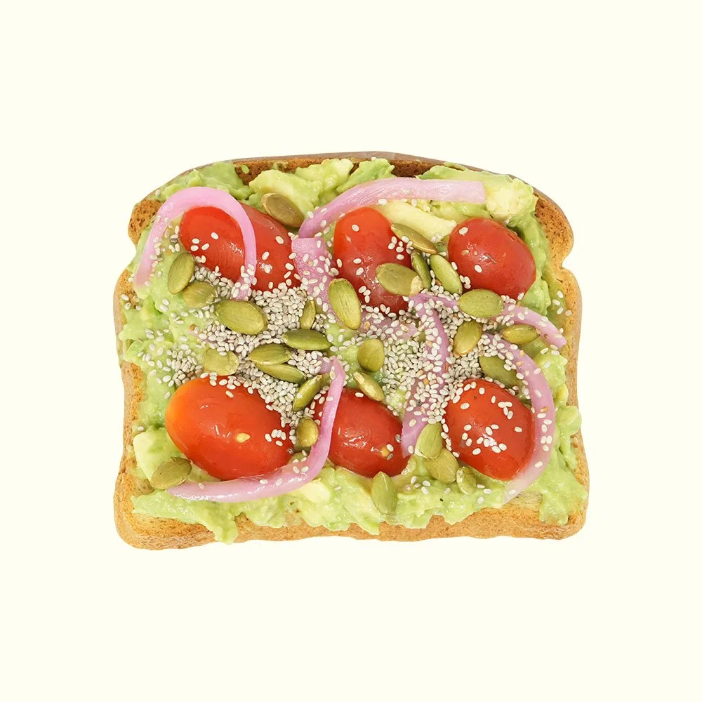 Avocado Toast - Two pieces of Udi’s gluten free bread, mashed avocado, pickled onions, tomato, pumpkin & chia seeds