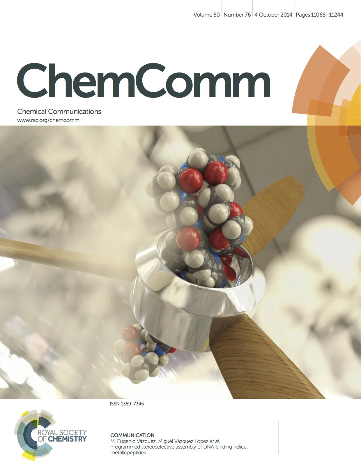 A molecular model of a DNA helix with a metallic ring and a wooden stick in the foreground, set against a blurred scientific background.