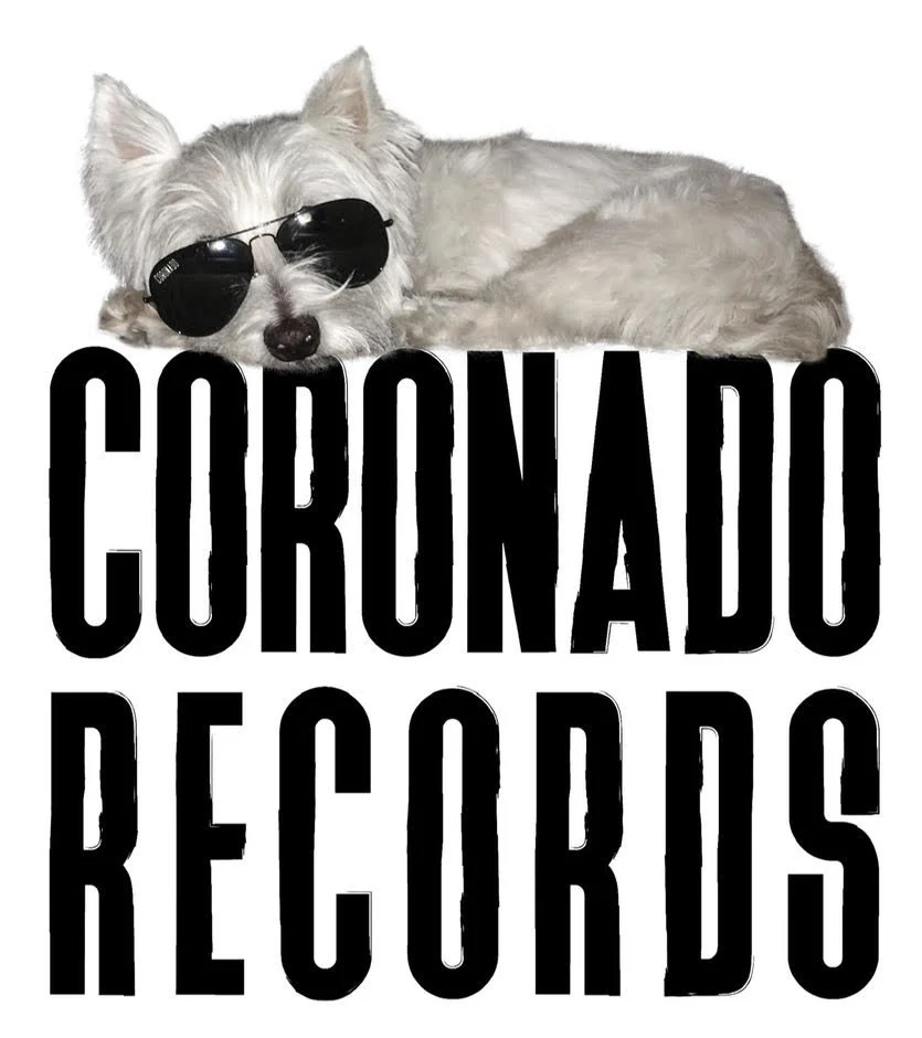 A white dog wearing black sunglasses lying down in front of the text 'CORNADO RECORDS' in bold black letters.