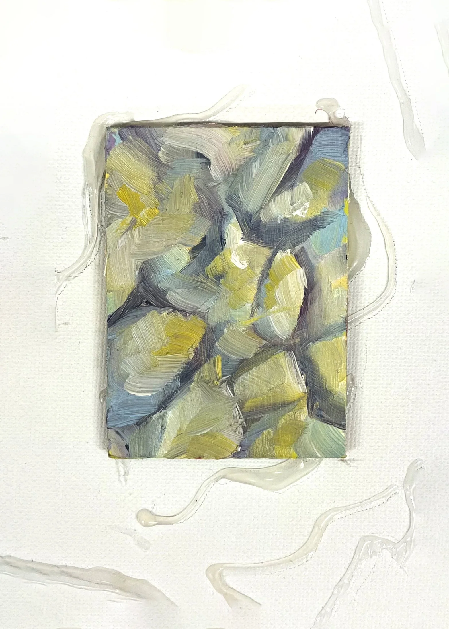 A small abstract painting with brushstrokes in yellow, blue, green, purple, and white on a white canvas, surrounded by swirling white paint.