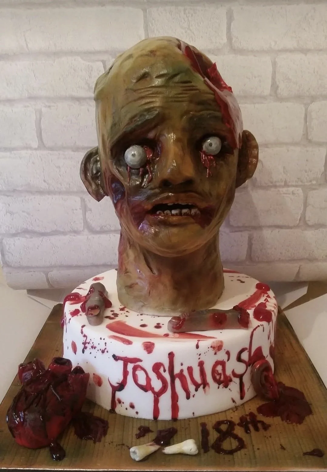 Scary severed head halloween birthday cake Merely Janes Cakes