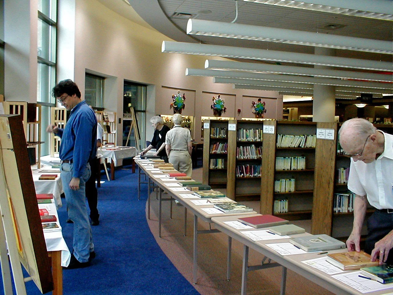 2001 - An annual Silent Auction to sell rare and collectible books was started