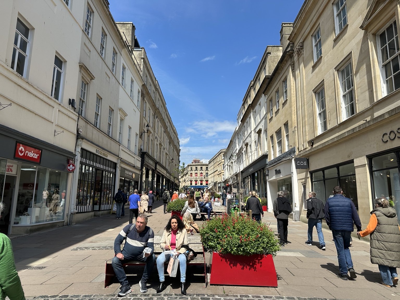 Busy UK high street showing retail shops, independent businesses and public spaces that support pop-up retail and destination marketing.