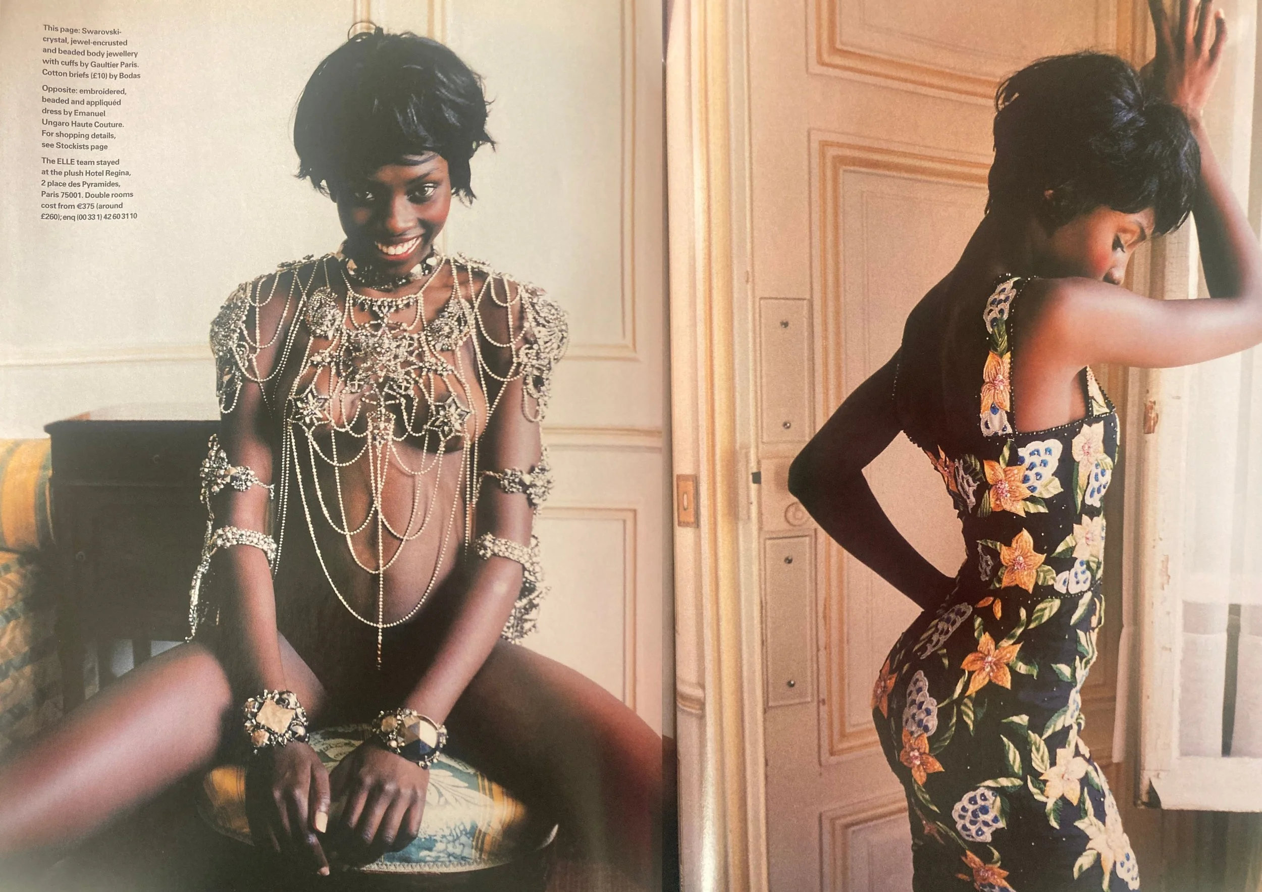 Double page fashion editorial from ELLE UK December 2003 showing a black woman with short hair wearing  Swarovski jewels on the left and a black gown with orange and green floral print on the right.