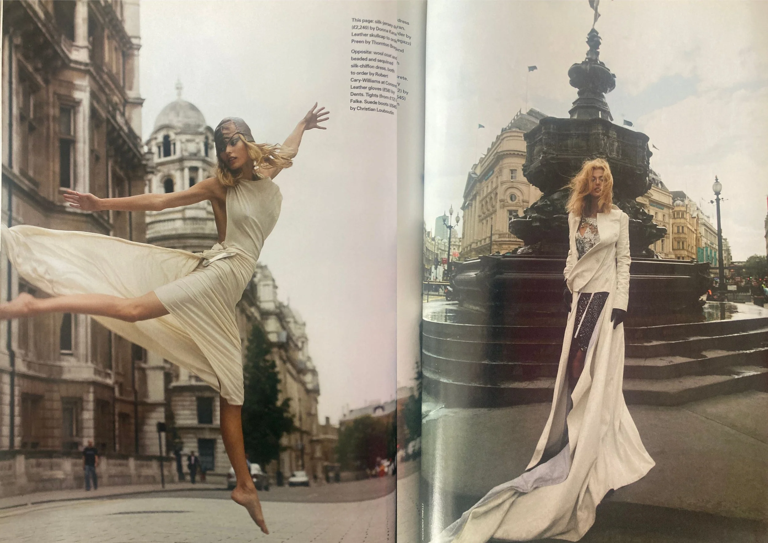 Double page fashion editorial from ELLE UK December 2003 showing a white woman with long blonde hair wearing white backless dress and head scarf on the left while jumping in the air and a long white jacket on the right.