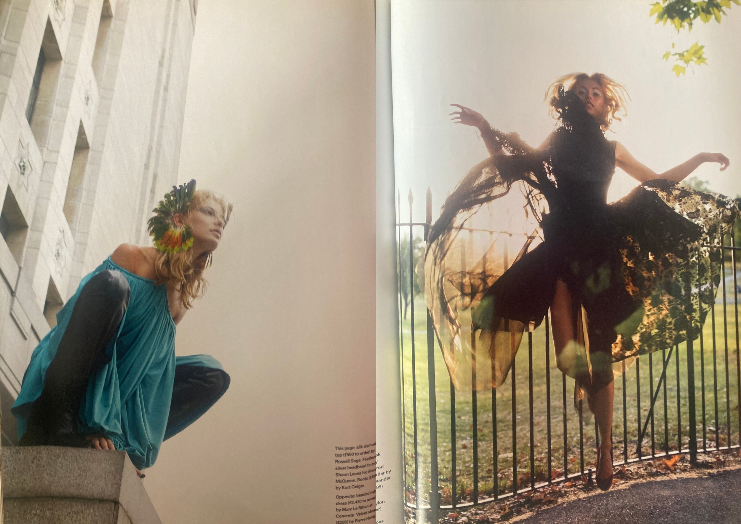 Double page fashion editorial from ELLE UK December 2003 showing a white woman with long blonde hair wearing a blue draped top the left and a black floaty dress on the right