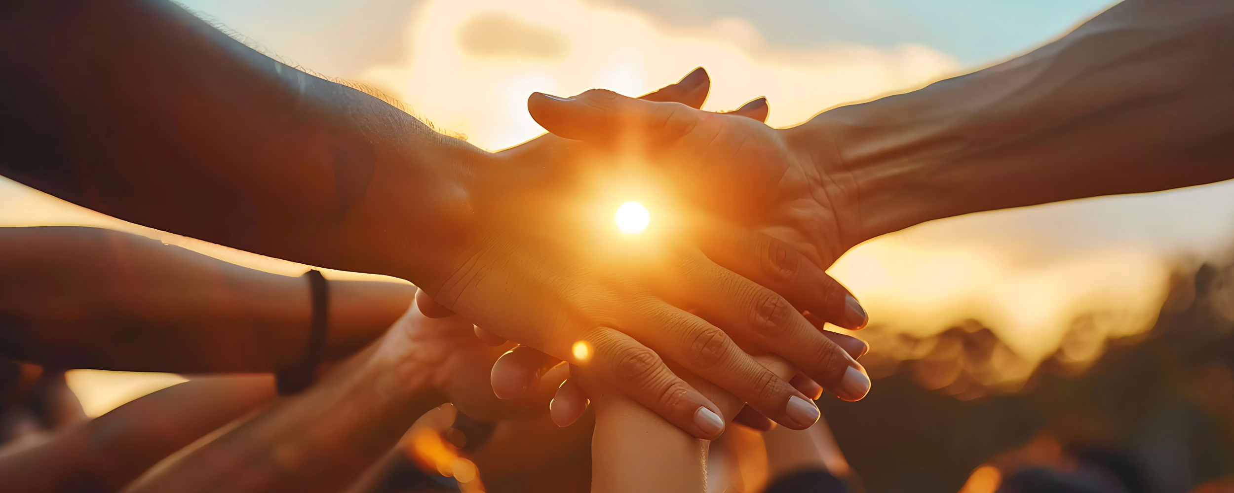 Holding hands to symbolize a collaborative approach to care