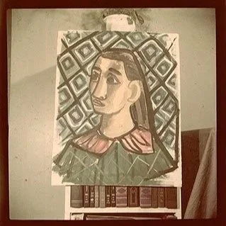 A painting of a woman with long hair, wearing a green outfit with a pink collar, set against a geometric patterned background.