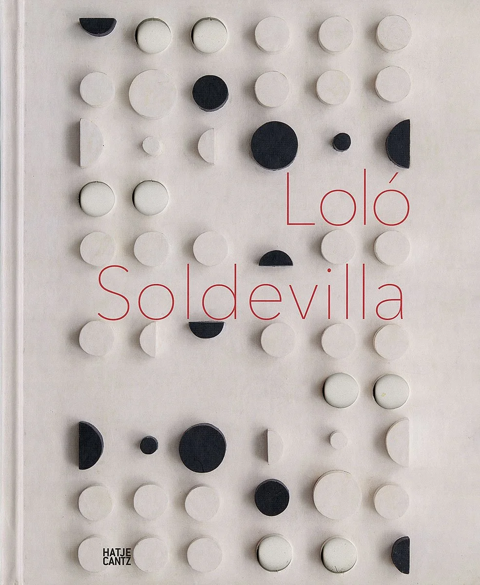 A minimalist poster with black and white circular and semi-circular shapes arranged in a geometric pattern. The words "Loló Soldevilla" are written in red across the center, and "Hatje Cantz" is in small black text at the bottom left corner.