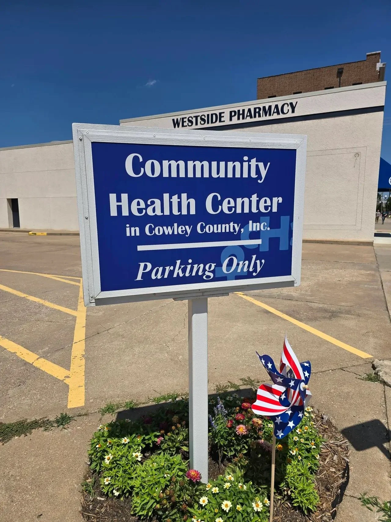 A sign outside the Community Health Center's Westside Pharmacy.