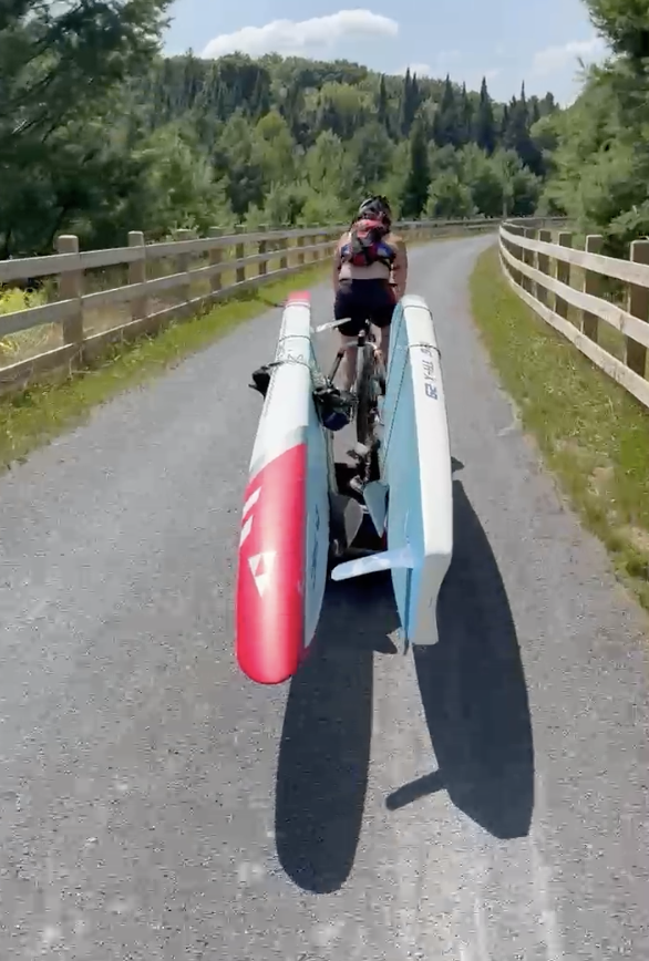Bike on trail with paddleboards