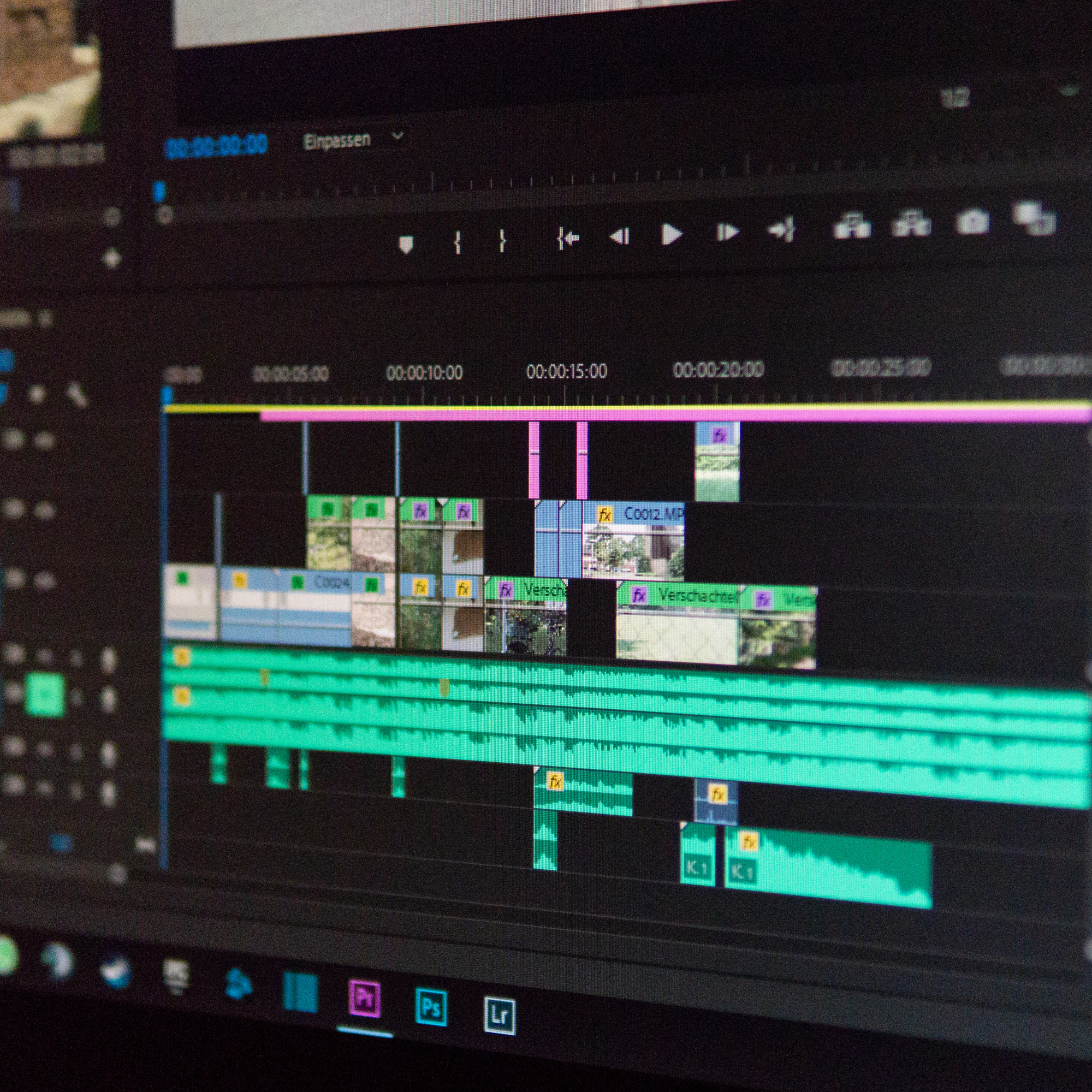 Screenshot of a video editing timeline with multiple tracks, including video clips, audio, and effects, on a computer screen.