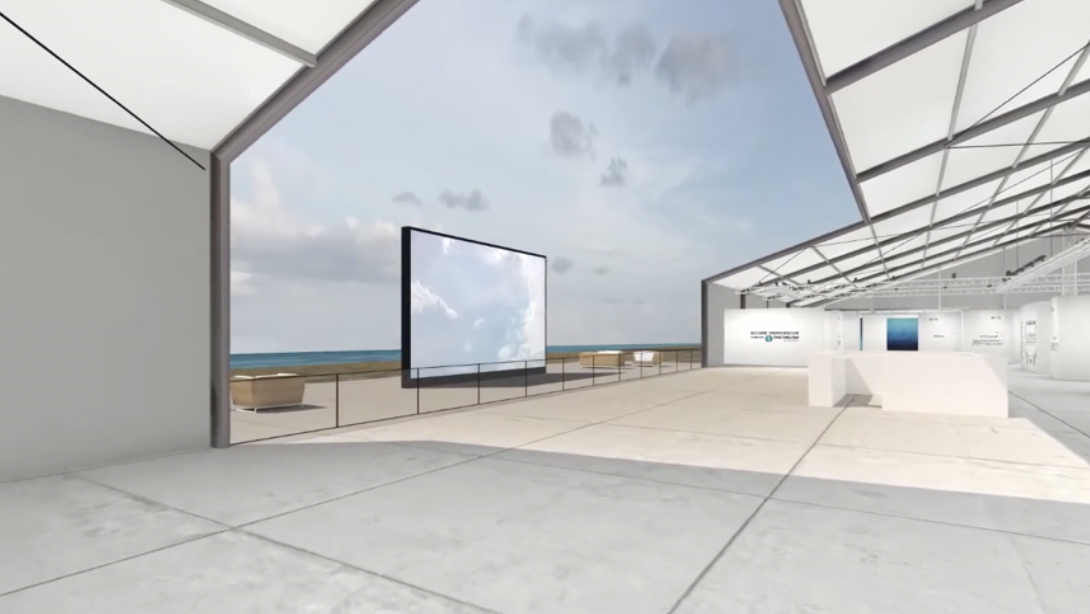 Modern indoor space with large open windows overlooking a beach and ocean, featuring a large digital screen and white interior design elements.