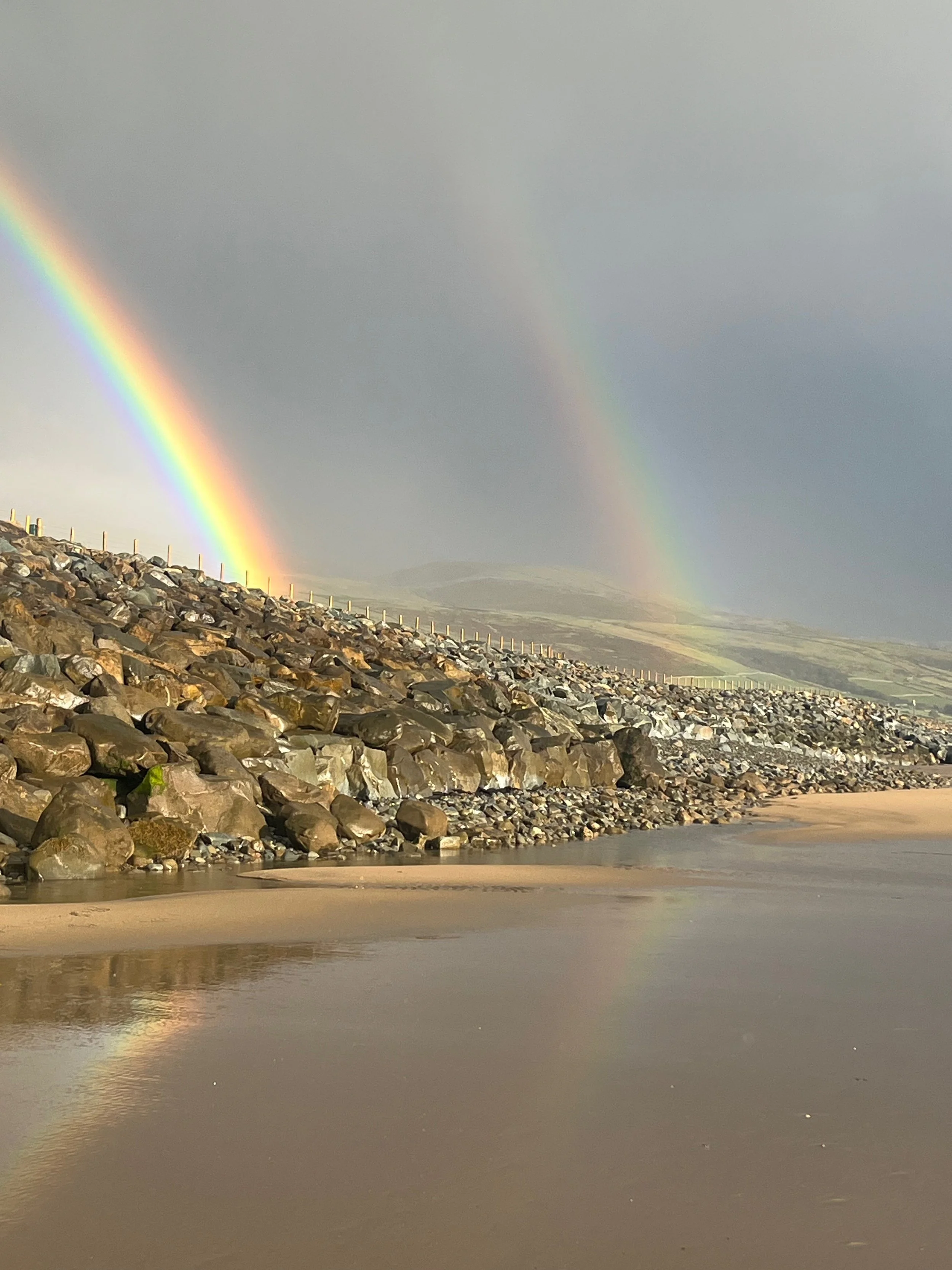 Double rainbow over the beach
