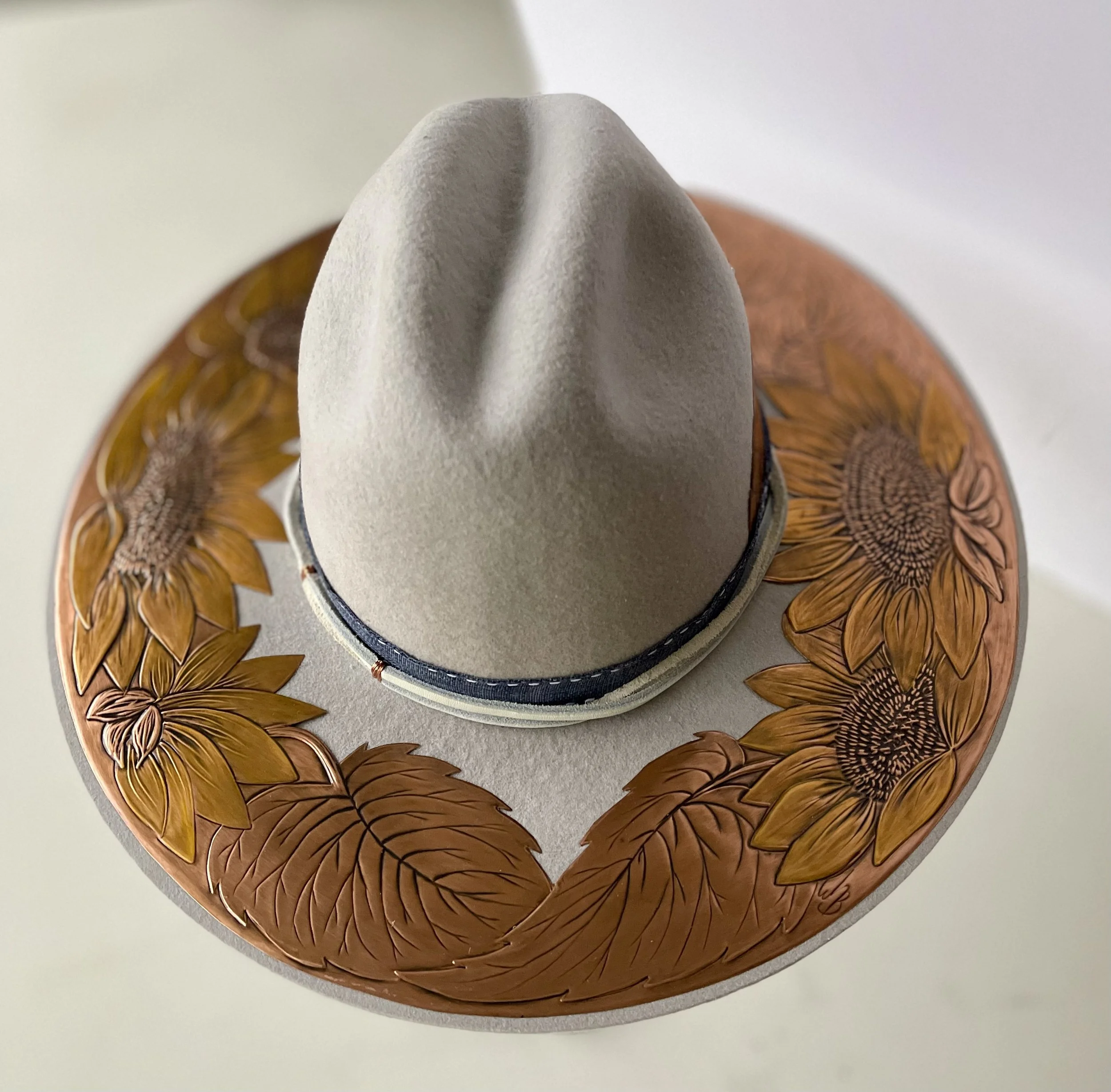 Erin Stelmaschuk Biegel artist, custom copper adorned cowboy hat, custom western hat, western art, prairie inspired, memorial, keepsake, smithbilt hat